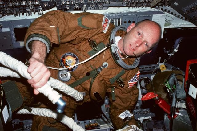 NASA image: Pilot Fullerton in ejection escape suit (EES) on aft flight deck
