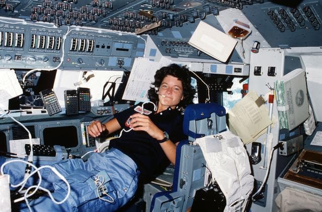 NASA image: Mission Specialist (MS) Ride at forward flight deck pilots stations controls
