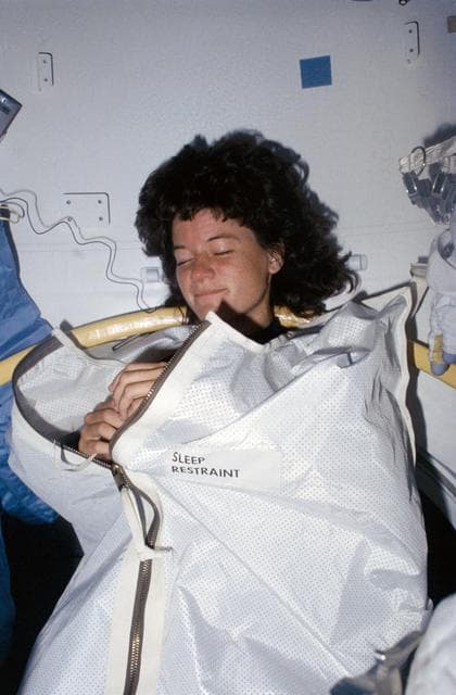 NASA image: Mission Specialist (MS) Ride sleeps in airlock