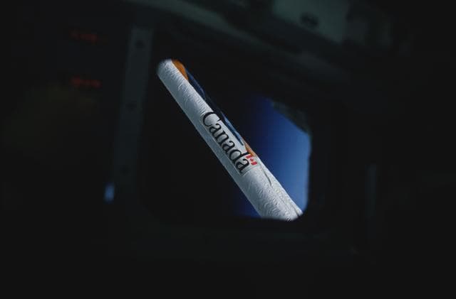 NASA image: RMS upper boom framed by aft flight deck viewing window W10