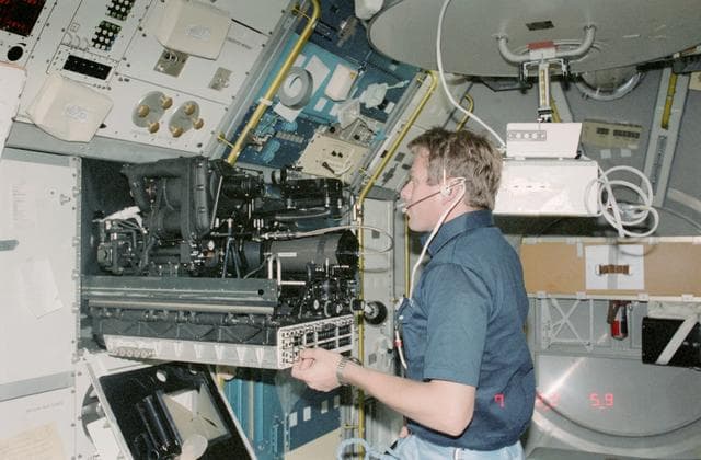 NASA image: Payload Specialist Byron K. Lichtenberg working in the Spacelab