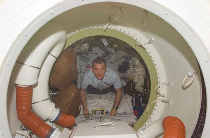NASA image: Voss near orbiter airlock