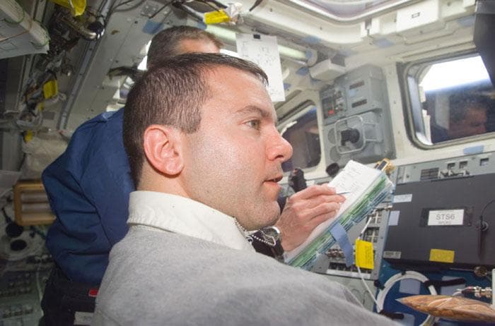 NASA image: MS Richards during hardware checkout on the flight deck