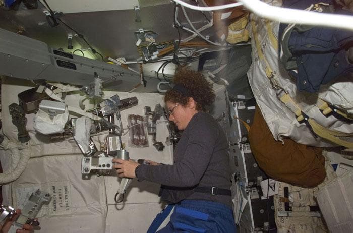 NASA image: MS Helms checks out her EVA space tools