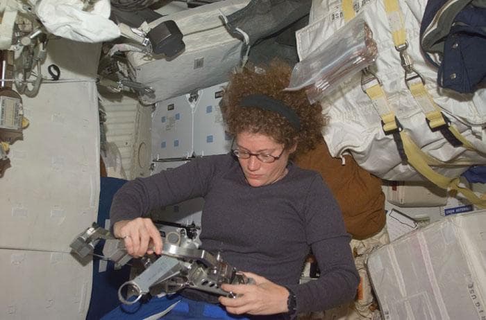 NASA image: MS Helms checks out her EVA space tools