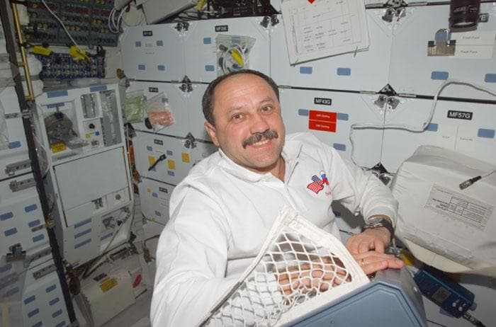 NASA image: Cosmonaut Usachev on the orbiter middeck