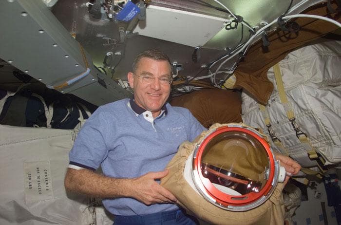 NASA image: Voss with his EMU suit in the middeck