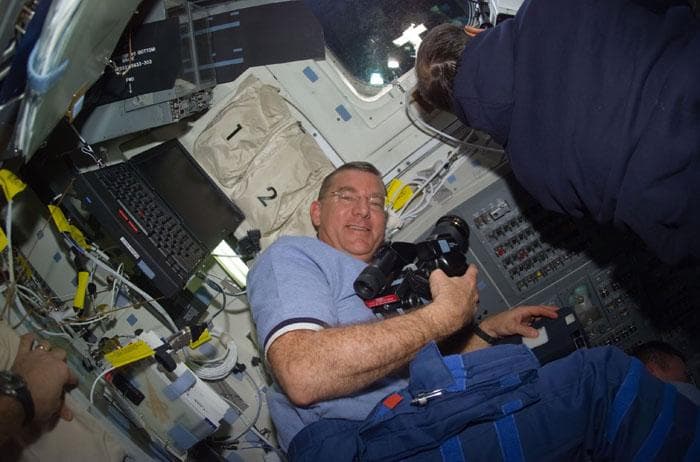NASA image: Voss on the flight deck with camera during rendezvous ops