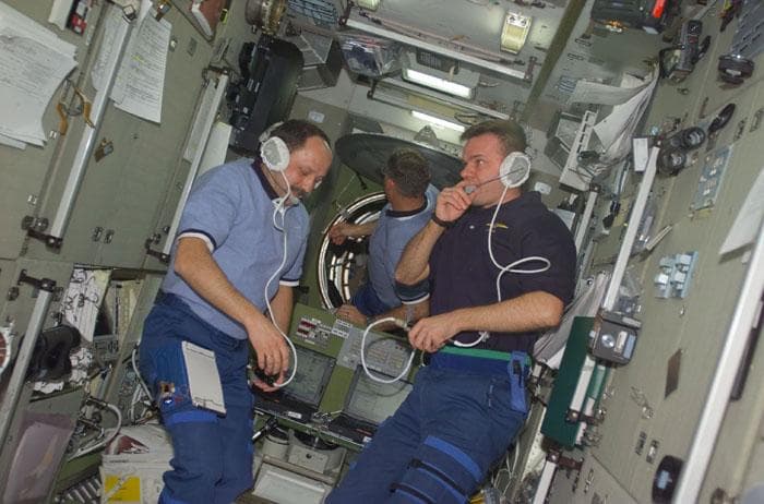 NASA image: Usachev and Gidzenko converse with ground controllers in the Service Module