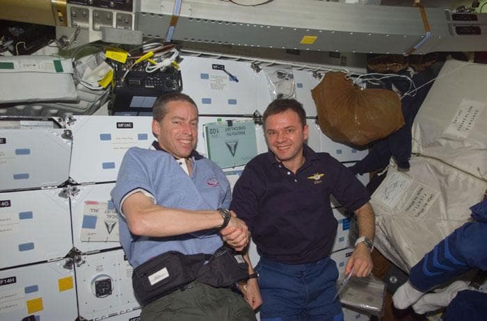 NASA image: Wetherbee welcomes Gidzenko to the STS-102 crew