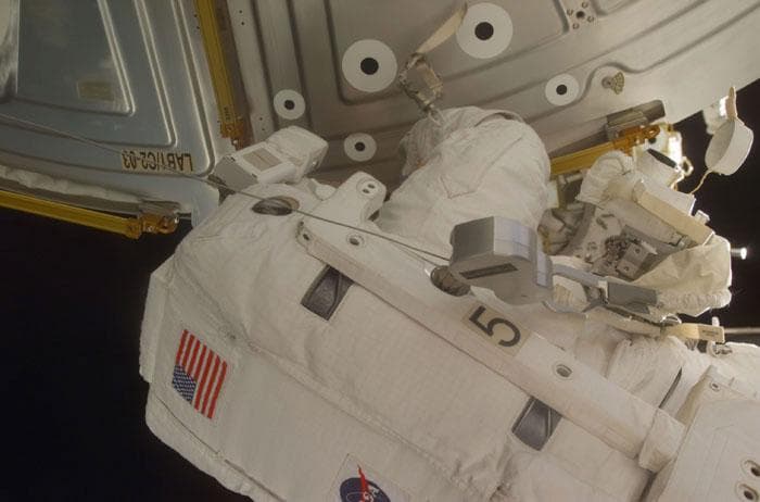 NASA image: Helms works on the Laboratory/Destiny during the first EVA