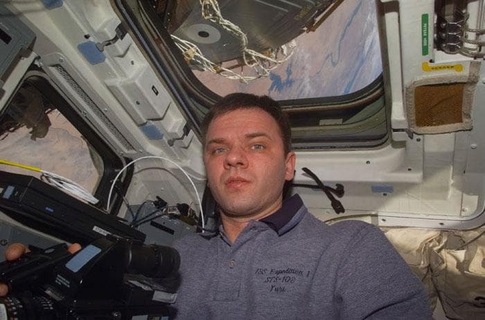 NASA image: Gidzenko in front of flight deck windows
