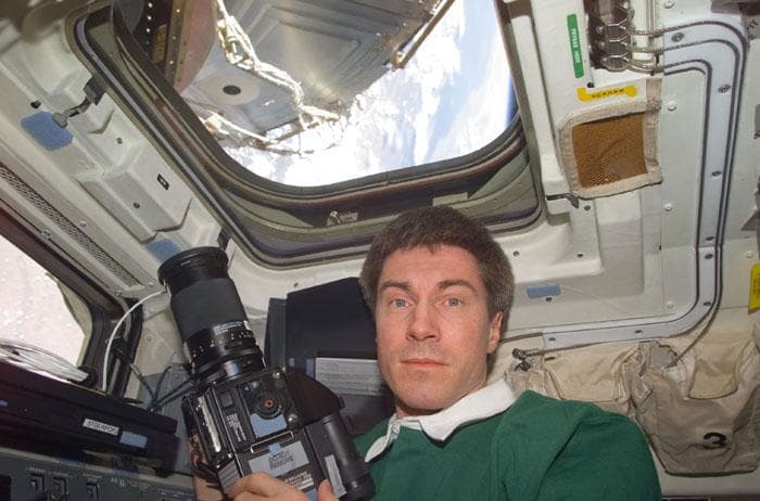 NASA image: Krikalev in front of flight deck windows