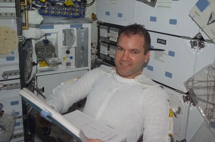 NASA image: Richards at work in the middeck