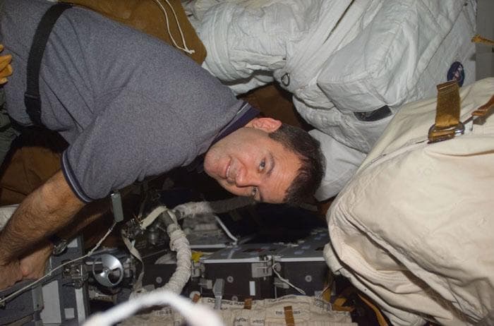 NASA image: Richards cleans the middeck