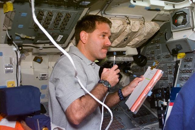 NASA image: MS Grunsfeld on the aft flight deck