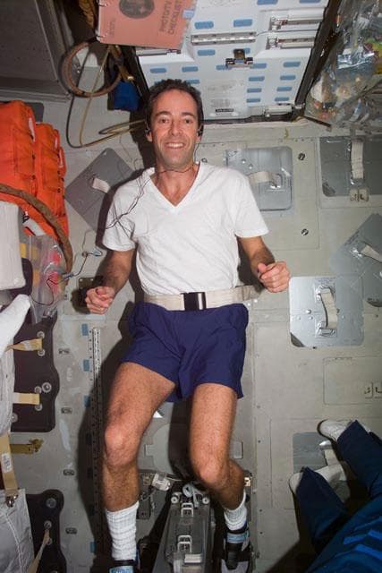 NASA image: MS Clervoy on ergometer on the middeck