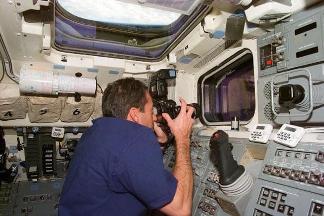 NASA image: MS Clervoy on aft flight deck with camera