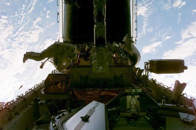 NASA image: EVA - Foale and Nicollier in payload bay.