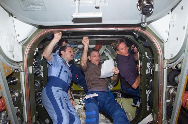NASA image: Usachev, Voss and Gernhardt install cables in Quest airlock