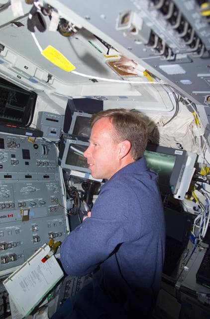 NASA image: CDR Lindsey at controls on Atlantis