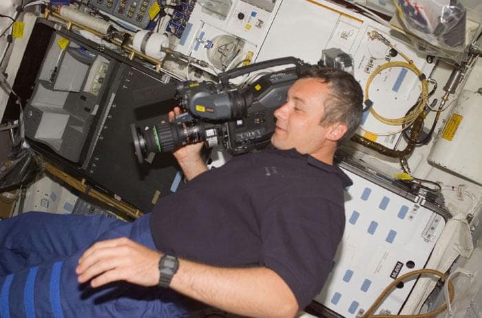 NASA image: Dezhurov uses a video camcorder on the orbiter middeck
