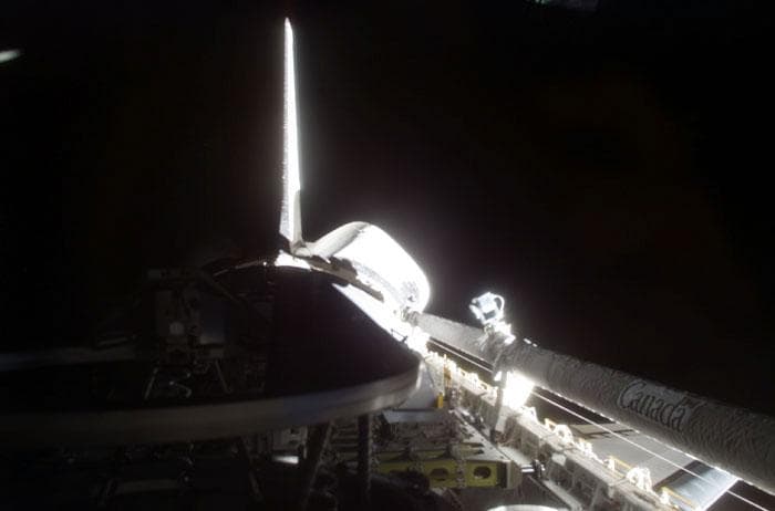 NASA image: Payload bay in low light condition, the APAS alignment ring is extended