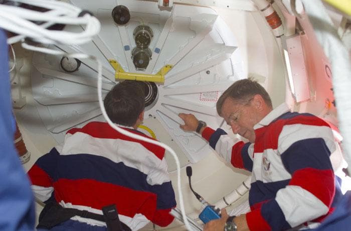 NASA image: Culbertson and Horowitz prepare to open the ODS hatch into the ISS