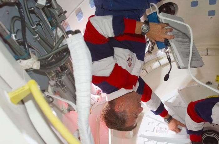 NASA image: Culbertson prepares to open the ODS hatch into the ISS