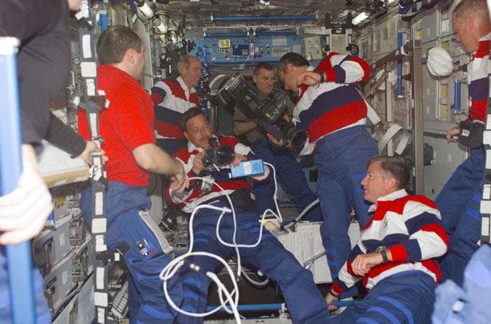NASA image: Greeting in the ISS between Expeditions Two, Three and STS-105 crewmembers