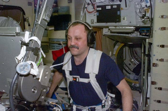 NASA image: Usachev exercises on the ISS Service Module/Zvezda treadmill