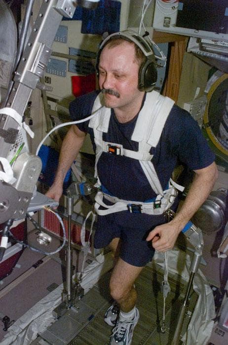 NASA image: Usachev exercises on the ISS Service Module/Zvezda treadmill