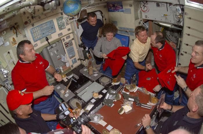 NASA image: Meal for Expedition Two, Three and STS-105 crews in the ISS Service Module/Zvezda