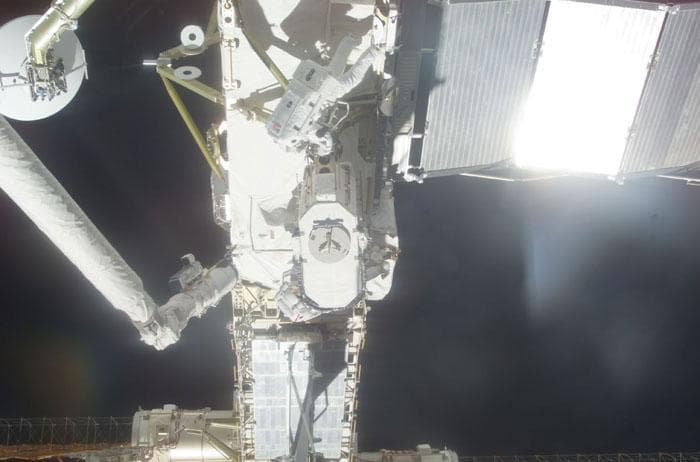 NASA image: Barry and Forrester stow the EAS on the P6 Truss