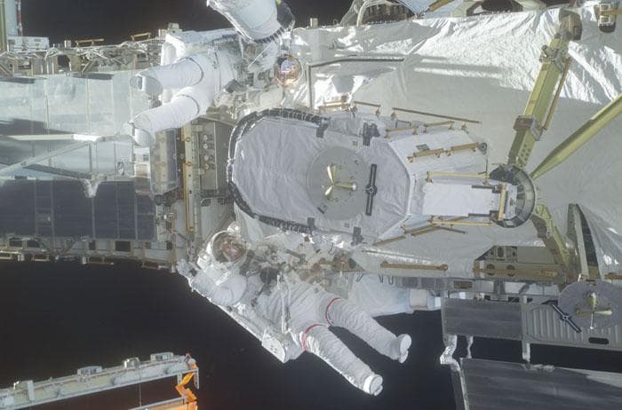 NASA image: Barry and Forrester stow the EAS on the P6 Truss