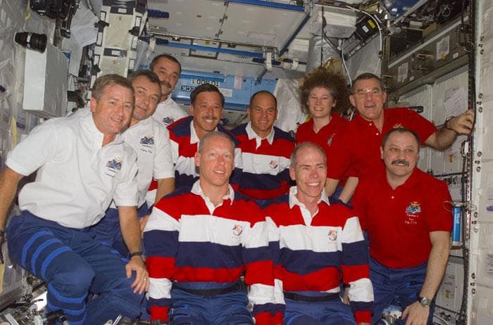 NASA image: STS-105, Expeditions Two and Three crew portrait in the ISS U.S. Laboratory/Destiny