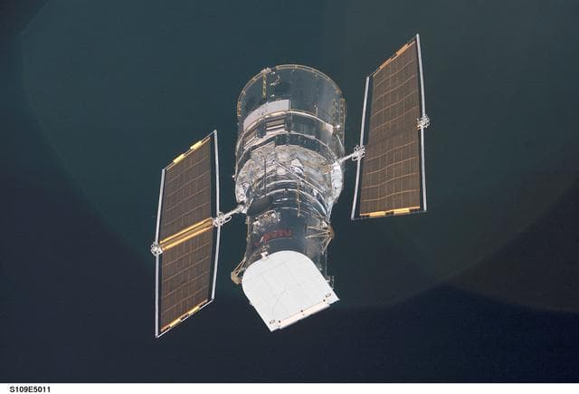 NASA image: Hubble Space Telescope prior to grapple by STS-109 orbiter Columbia