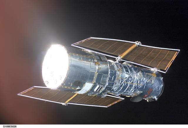 NASA image: Hubble Space Telescope prior to grapple by STS-109 orbiter Columbia
