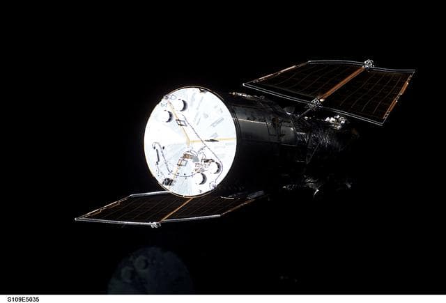 NASA image: Aft end Hubble Space Telescope prior to grapple by STS-109 orbiter Columbia