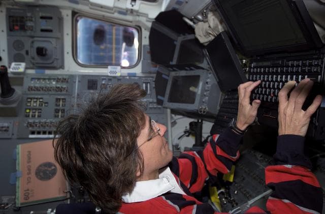 NASA image: STS-109 MS Currie on aft flight deck