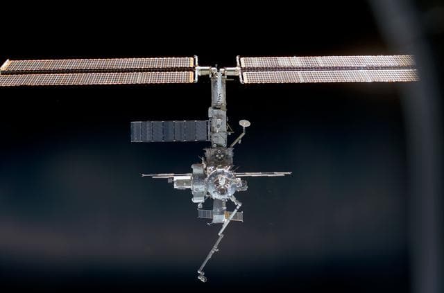NASA image: Full view of the ISS taken during STS-110's docking approach