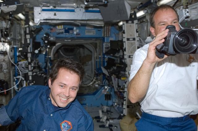 NASA image: Bursch and Bloomfield in the U.S. Laboratory during STS-110's initial ingress into the ISS