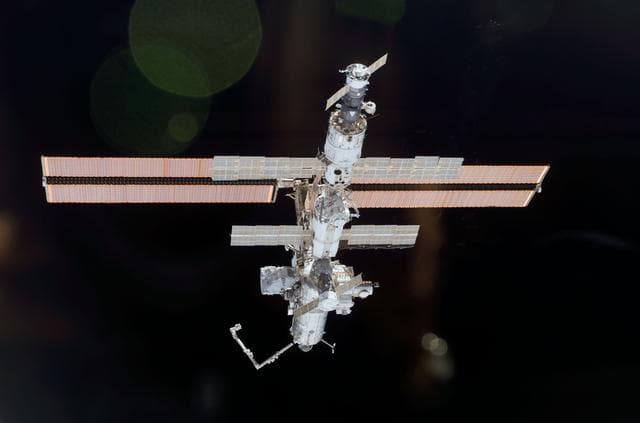 NASA image: Aft view of the ISS taken during STS-110's undocking and final flyaround