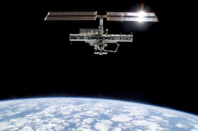 NASA image: Overall exterior views of the ISS during Undocking and Flyaround Operations for STS-113 (11A)