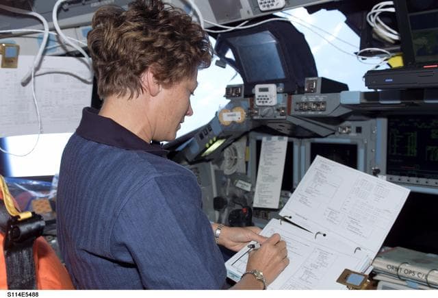 NASA image: Collins on forward flight deck