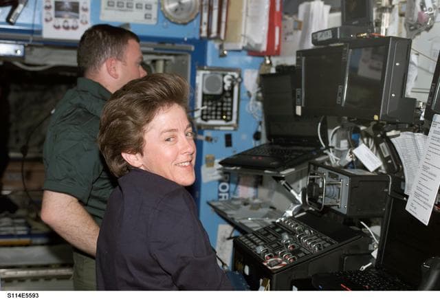 NASA image: Lawrence and Kelly at SSRMS controls in Destiny module