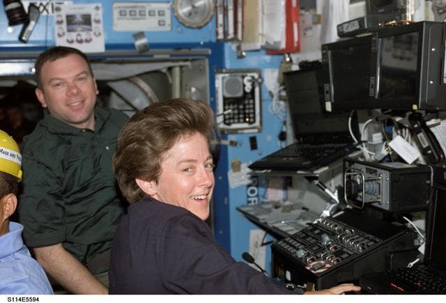 NASA image: Lawrence and Kelly at SSRMS controls in Destiny module