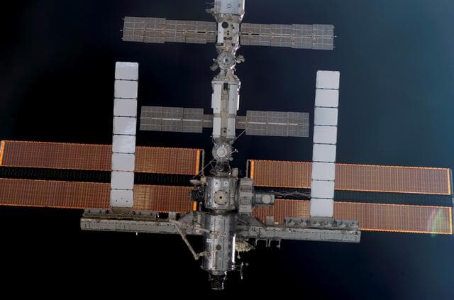 NASA image: Nadir side Exterior views of ISS during Approach and Docking Operations for STS-114