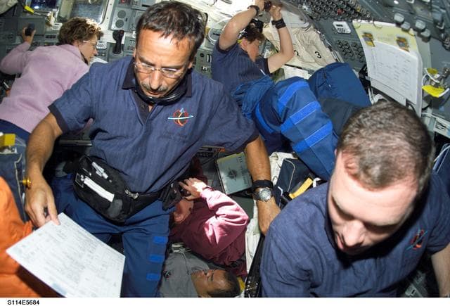 NASA image: STS-114 crew on flight deck during rendezvous and docking