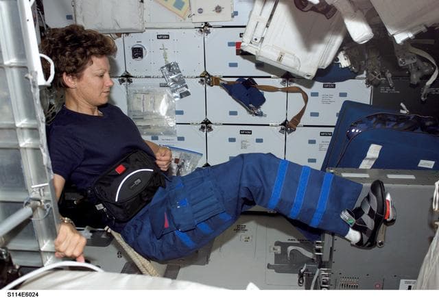 NASA image: Collins works out on Ergometer on Middeck